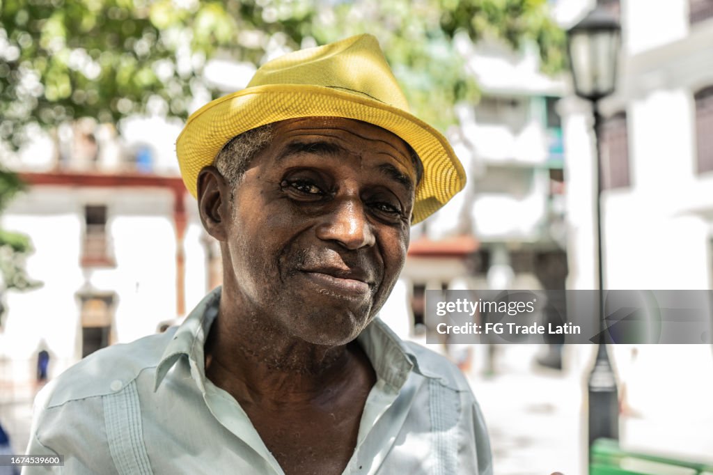 Portrait of a senior man in the town square