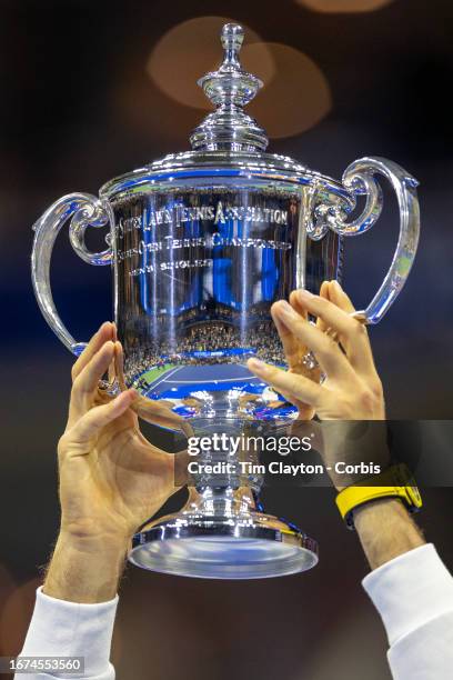 September 10: The hands of Novak Djokovic of Serbia with the winners trophy after his victory against Daniil Medvedev of Russia in the Men's Singles...