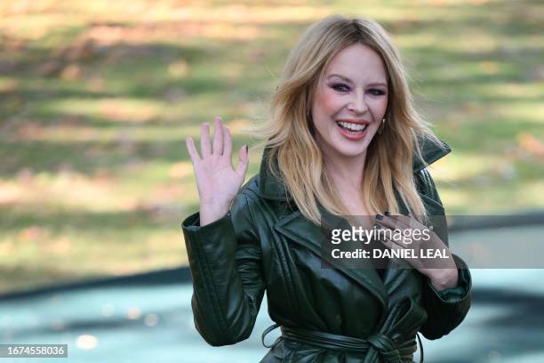 Australian singer Kylie Minogue arrives to attend the catwalk presentation for British fashion house Burberry's Spring/Summer 2024 collection, at...