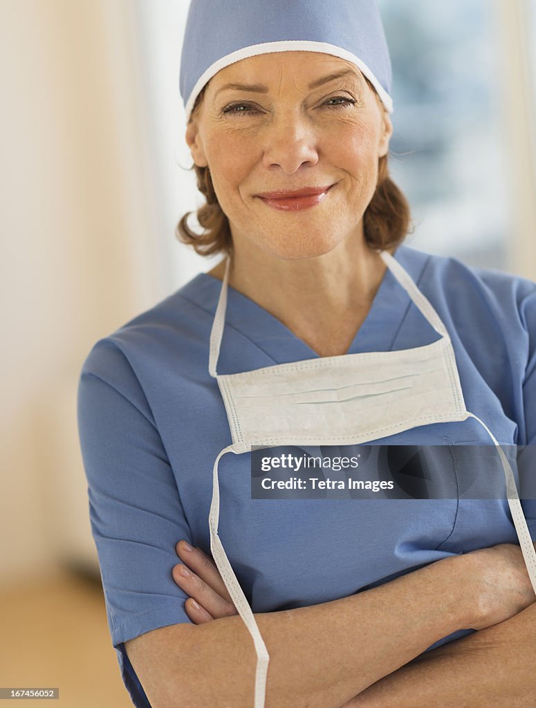 USA, New Jersey, Jersey City, Portrait of smiling female surgeon