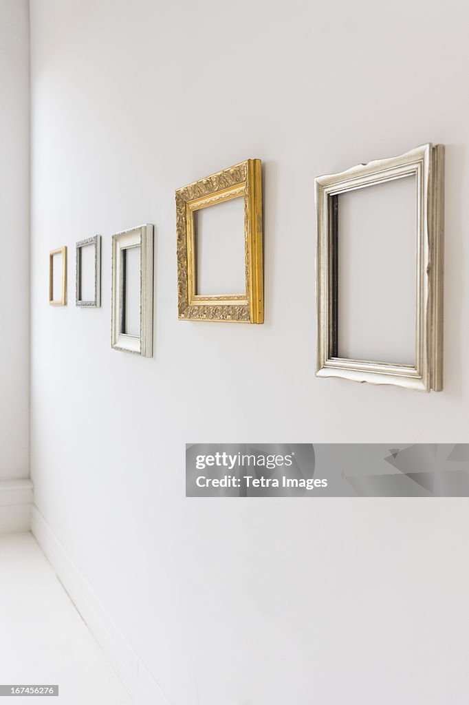 USA, New Jersey, Jersey City, Empty picture frames in art gallery