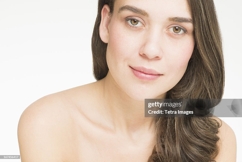 Portrait of young woman, studio shot