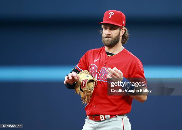 Bryce Harper of the Philadelphia Phillies fields against the Toronto Blue Jays at Rogers Centre on August 16, 2023 in Toronto, Ontario, Canada.