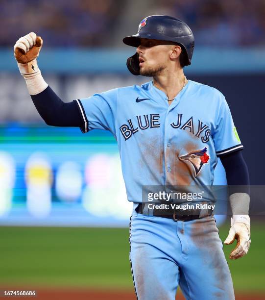 Cavan Biggio of the Toronto Blue Jays reacts against the Philadelphia Phillies at Rogers Centre on August 16, 2023 in Toronto, Ontario, Canada.