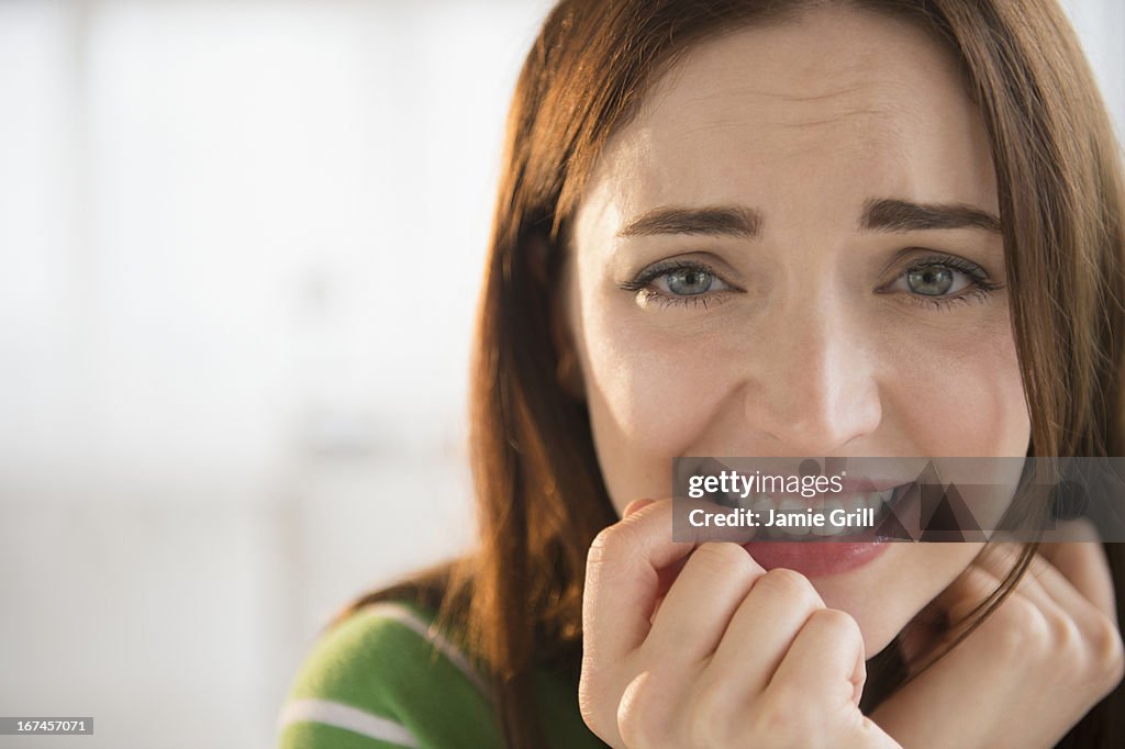 USA, New Jersey, Jersey City, Portrait of young woman under stress