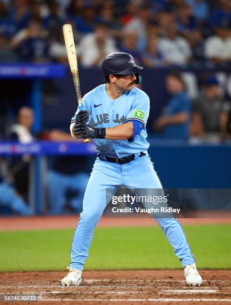 Davis Schneider of the Toronto Blue Jays bats against the Philadelphia Phillies at Rogers Centre on August 16, 2023 in Toronto, Ontario, Canada.