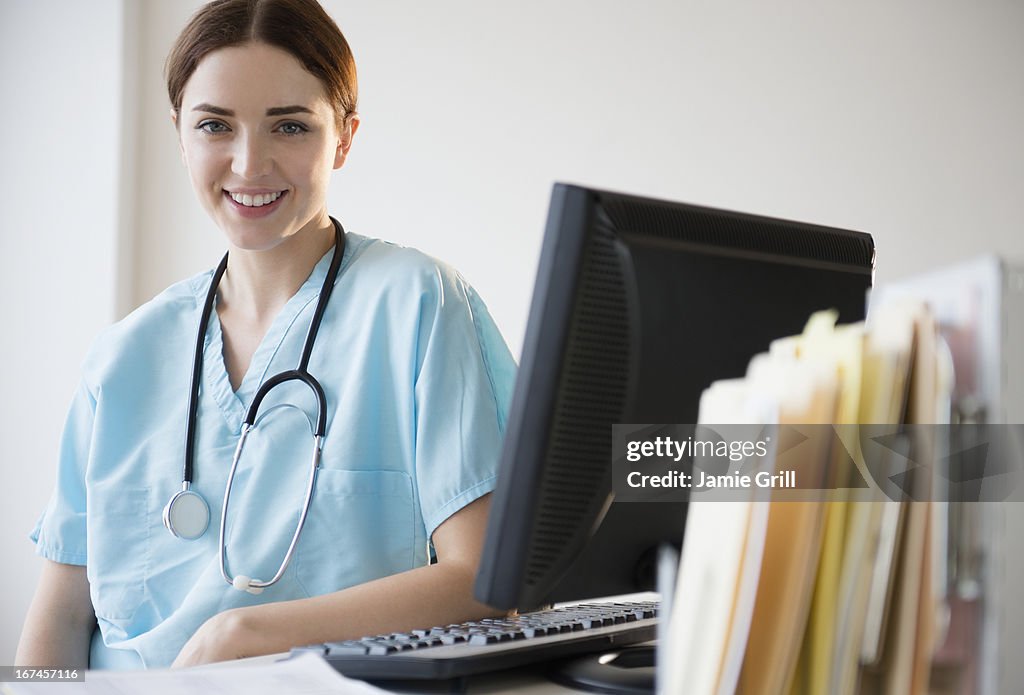 USA, New Jersey, Jersey City, Portrait of female doctor in hospital uniform