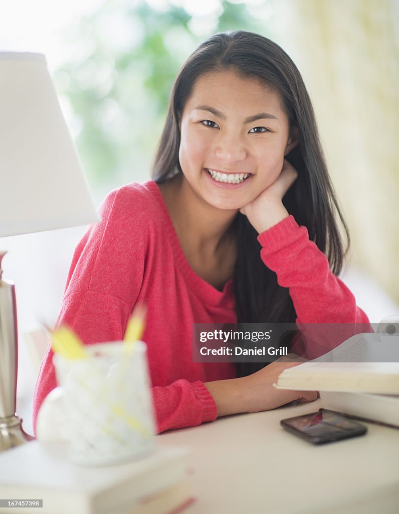 USA, New Jersey, Jersey City, Portrait of teenage girl ( 16-17 years) smiling