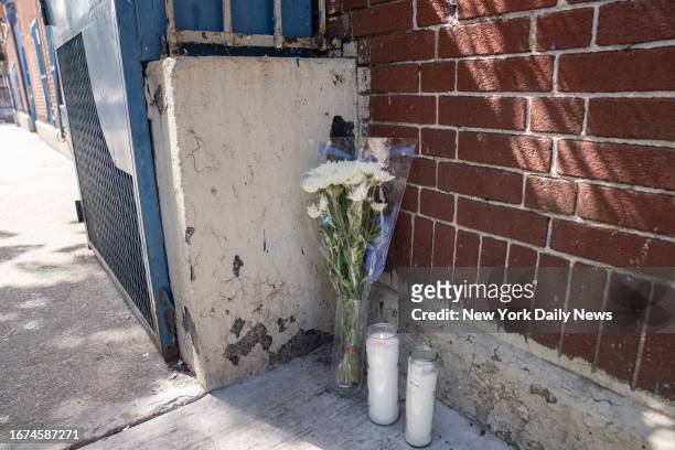 September 17: Flowers and candles placed at the scene of the Day Care death of 1yr old Nicholas Dominici. Suspects Grei Mendez and Carlisto...