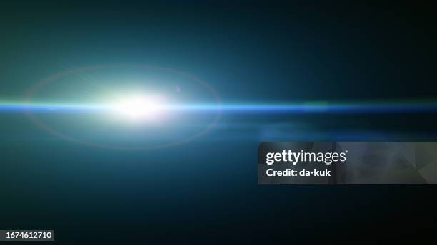 blue lens flare overlay on black background design element - anamorphic lens flare stock pictures, royalty-free photos & images