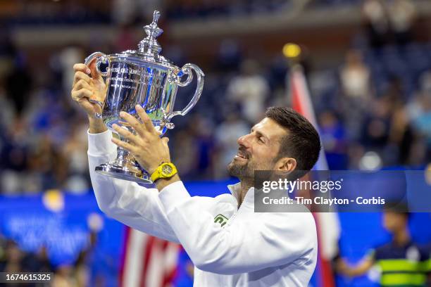 September 10: Novak Djokovic of Serbia with the winners' trophy after his victory against Daniil Medvedev of Russia in the Men's Singles Final on...