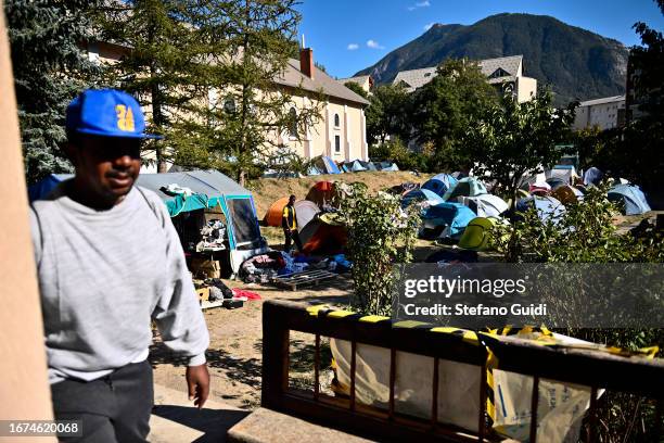 General view of migrants inside tent city managed by the Refuges Solidaires association on September 11, 2023 in Briancon, France. A tent city that...