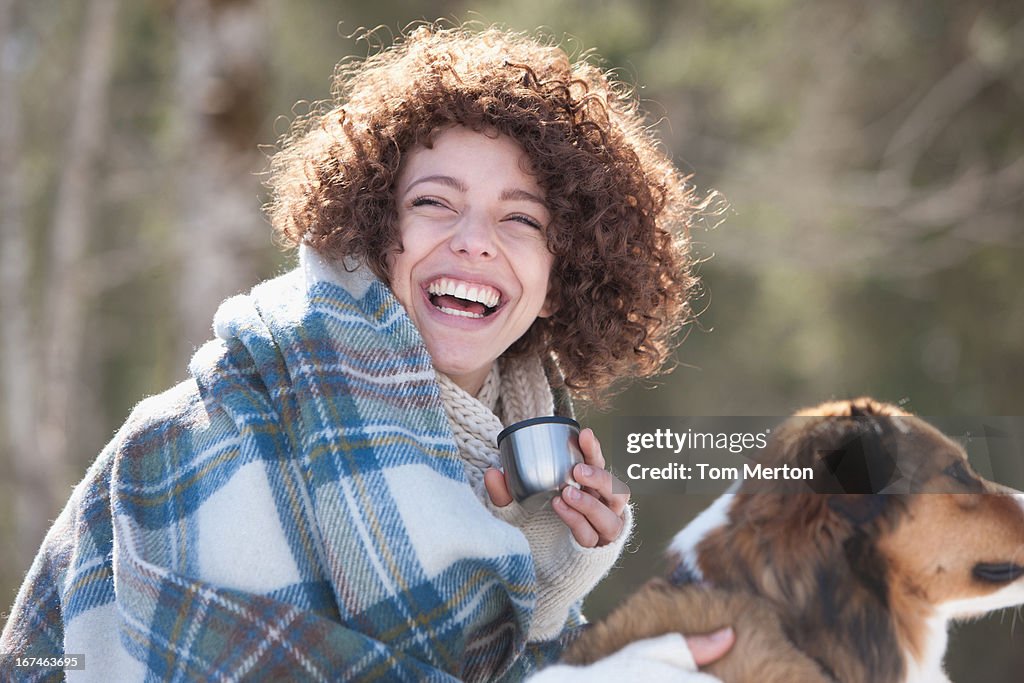 Woman and dog outdoors, winter