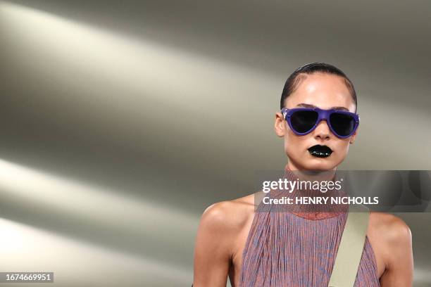 Model presents a creation during a catwalk presentation for British fashion house Burberry's Spring/Summer 2024 collection, at London Fashion Week in...