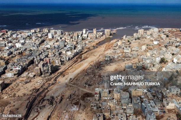 An aerial view shows Libya's eastern city of Derna on September 18 following deadly flash floods. A week after a tsunami-sized flash flood devastated...