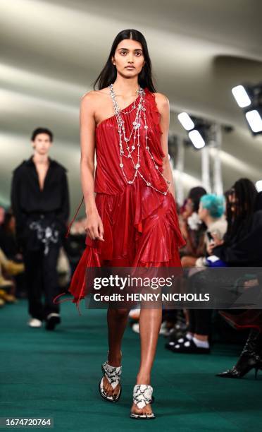 Model presents a creation during a catwalk presentation for British fashion house Burberry's Spring/Summer 2024 collection, at London Fashion Week in...