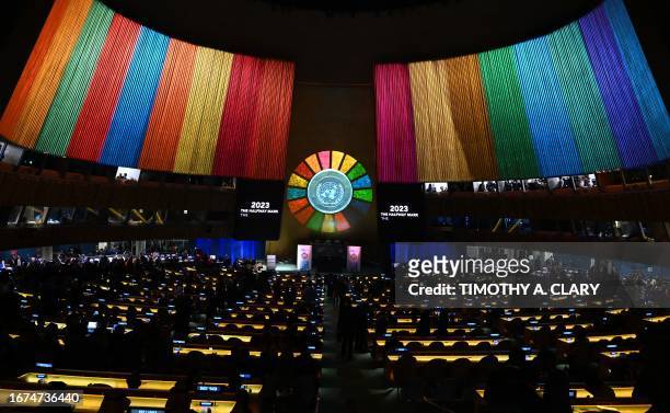 Delegates watch a video presentation during the opening session of the second Sustainable Development Goals Summit in New York City on September 18...