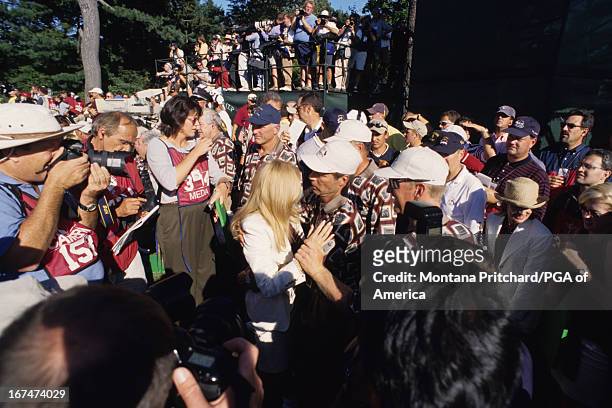 Captain Ben and Julie Crenshaw in the crowd of media during the 33rd Ryder Cup Matches held at The Country Club in Brookline, Massachusetts. Sunday,...