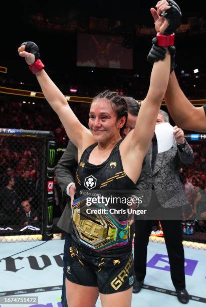 Alexa Grasso of Mexico reacts after retaining her title with a draw against Valentina Shevchenko of Kyrgyzstan in the UFC flyweight championship...