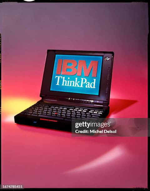 ThinkPad laptop computer on red background. Photo by Michel Delsol/Getty Images