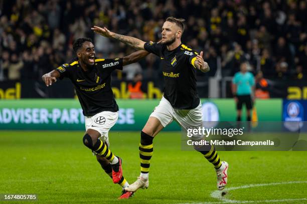 Alexander Milosevic of AIK celebrates with teammate Abdihakin Ali after scoring the 1-0 goal during an Allsvenskan match between AIK and Degerfors IF...