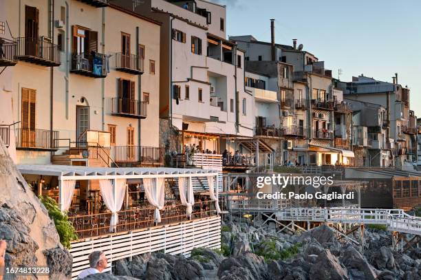 cefalù, restaurants and terraces overlooking the sea - view-through-restaurant-window stock pictures, royalty-free photos & images