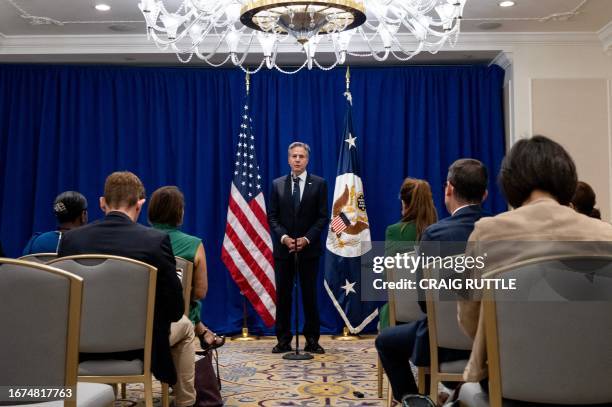 Secretary of State Antony Blinken speaks during a news conference as he announces that five Americans who had been jailed for years in Iran have been...