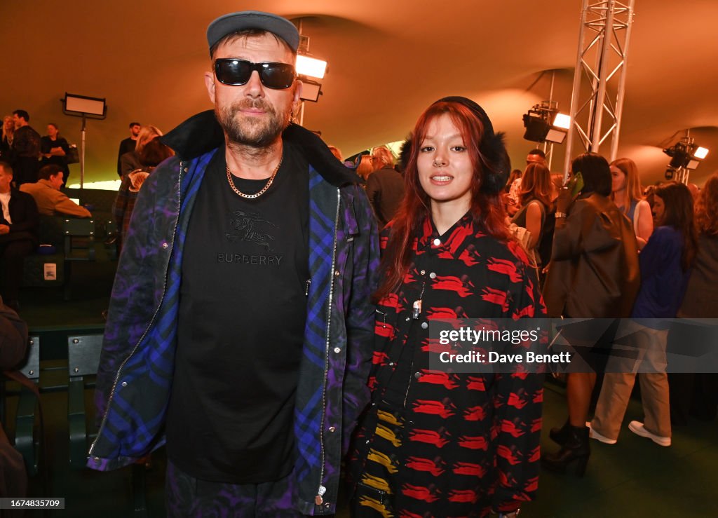 Damon Albarn and Missy Albarn attend the Burberry Spring Summer