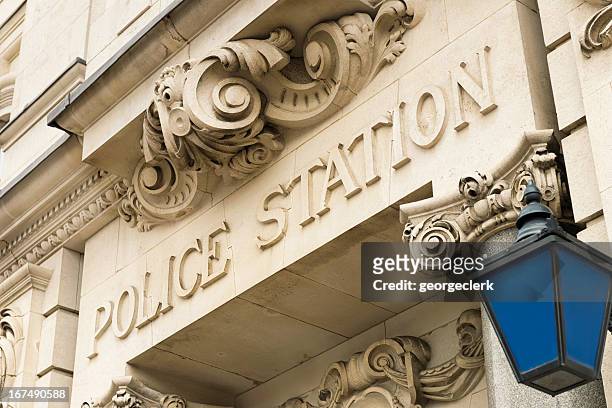 traditional police station sign and lantern - police station stock pictures, royalty-free photos & images