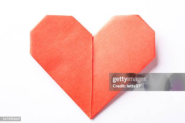 a red origami heart on a white background - oragami bildbanksfoton och bilder