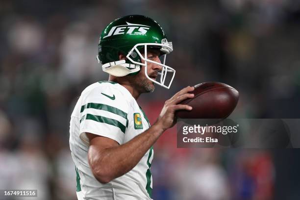 Quarterback Aaron Rodgers of the New York Jets warms up before the NFL game against the Buffalo Bills at MetLife Stadium on September 11, 2023 in...