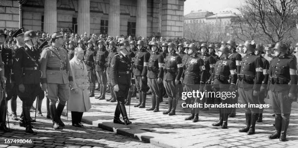 Swearing-in of the Austrian police on Heldenplatz. Reinhard Heydrich and Heinrich Himmler walk down the front. Heldentor/Heldenplatz. Vienna. March...