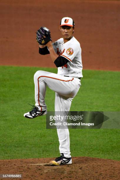 Shintaro Fujinami of the Baltimore Orioles throws a pitch during the sixth inning against the New York Yankees at Oriole Park at Camden Yards on July...