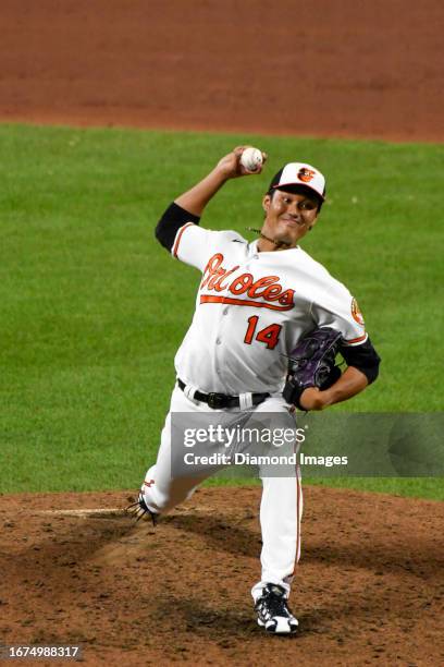 Shintaro Fujinami of the Baltimore Orioles throws a pitch during the sixth inning against the New York Yankees at Oriole Park at Camden Yards on July...