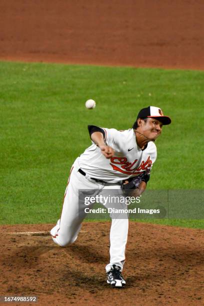 Shintaro Fujinami of the Baltimore Orioles throws a pitch during the sixth inning against the New York Yankees at Oriole Park at Camden Yards on July...