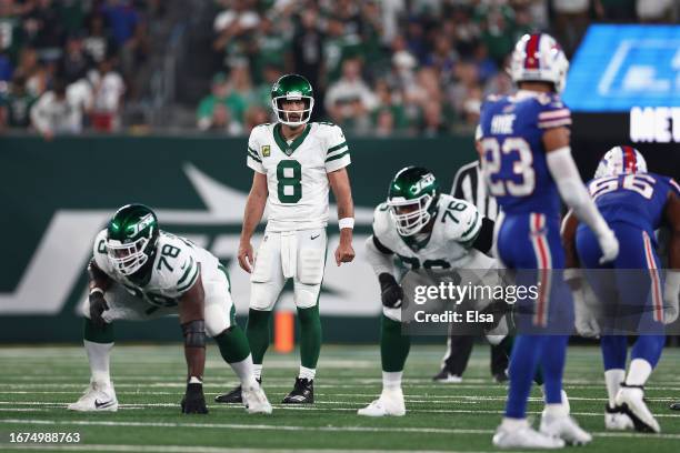 Quarterback Aaron Rodgers of the New York Jets prepares to snap the football during the first quarter of the NFL game against the Buffalo Bills at...