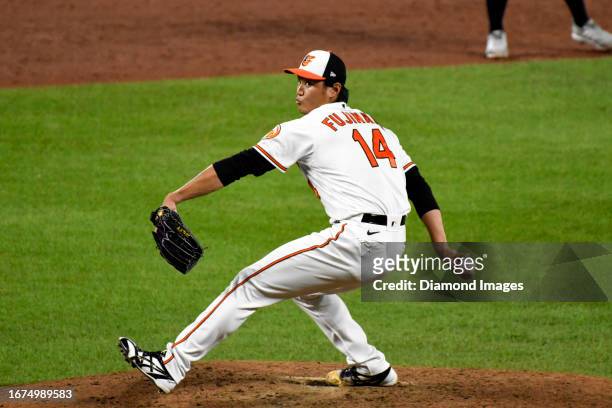 Shintaro Fujinami of the Baltimore Orioles throws a pitch during the sixth inning against the New York Yankees at Oriole Park at Camden Yards on July...