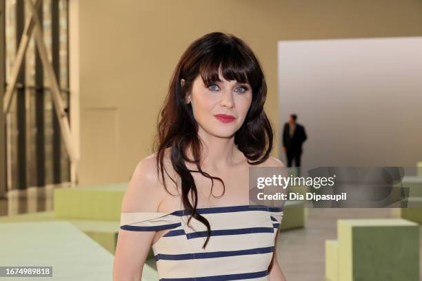 Zooey Deschanel poses at the Rosie Assoulin Presentation during New York Fashion Week The Shows at Gallery at Spring Studios on September 11, 2023 in...