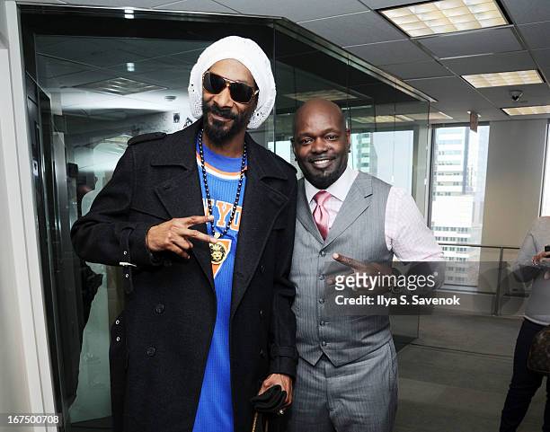 Snoop Lion and Emmit Smith visit the SiriusXM Studios on April 25, 2013 in New York City.