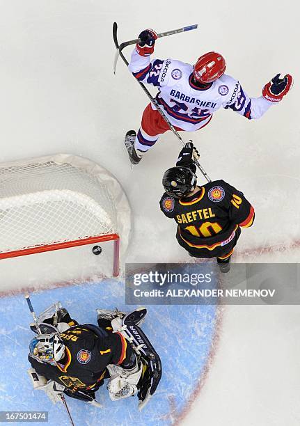 Russia's forward Ivan Barbashev celebrates after scoring during a IIHF U18 International Ice Hockey World Championship quarter-final match Russia vs...
