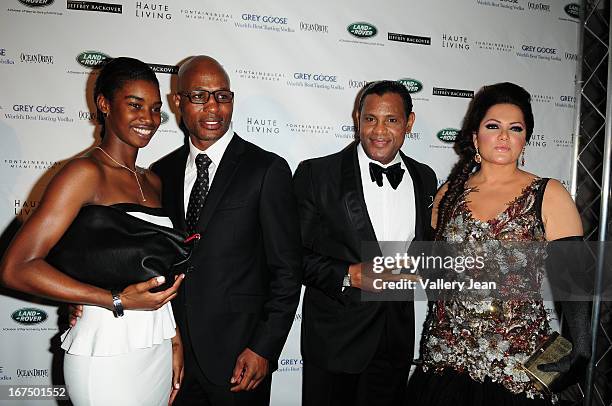 Jeanette Hopkins, Bernard Hopkins, Sammy Sosa and Sonia Sosa attend The Blacks' Annual Gala 2013 at Fontainebleau Miami Beach on April 13, 2013 in...