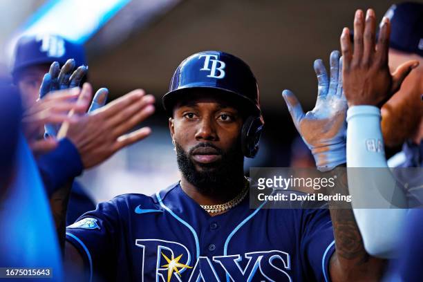 Randy Arozarena of the Tampa Bay Rays celebrates scoring a run on an RBI single by teammate Jose Siri against the Minnesota Twins in the third inning...