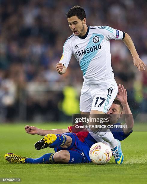 Basel's midfielder Fabian Frei vies with Chelsea's Belgian midfielder Eden Hazard during an UEFA Europa League first leg semi-final football match...