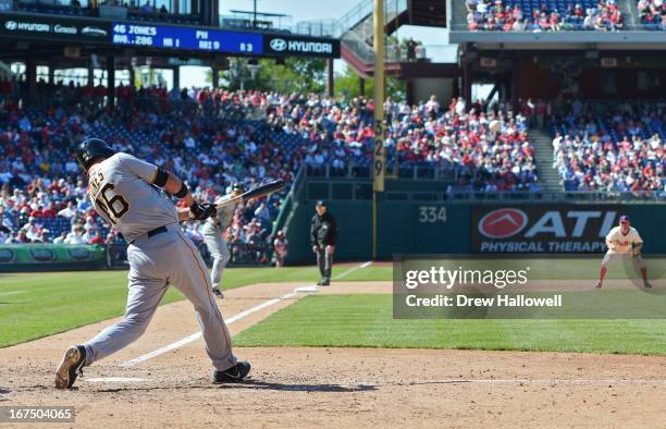 Garrett Jones of the Pittsburgh Pirates hits a two run double in the eighth inning against the Philadelphia Phillies at Citizens Bank Park on April...