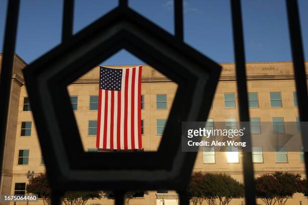 An American flag is shown hung in observance of the 9/11 terrorist attacks at the Pentagon on September 11, 2023 in Arlington, Virginia. Today marks...