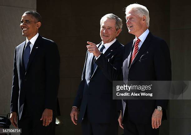 President Barack Obama, former President George W. Bush, and former President Bill Clinton attend the opening ceremony of the George W. Bush...