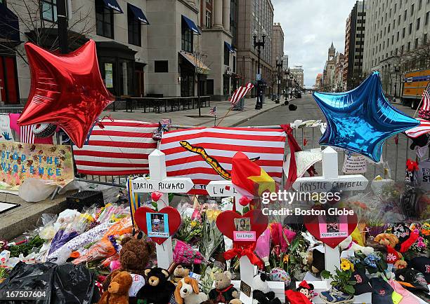 Memorial set up at a barricade on Boylston Street, blocks away from the Boston Marathon explosions. Three days earlier, two explosions went off at...
