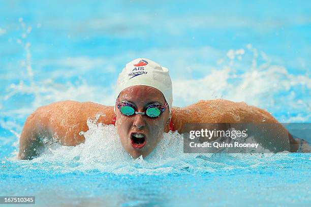 Alicia Coutts of Australia competes in the Women's 100 Metre Butterfly Heats during day one of the Australian Swimming Championships at the SA...