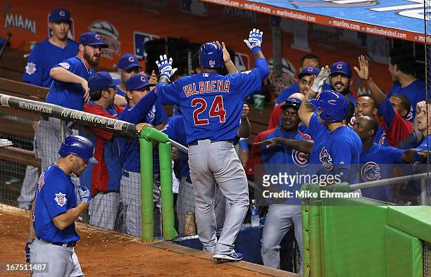 Luis Valbuena of the Chicago Cubs celebrates a ninth inning solo home run during a game against the Miami Marlins at Marlins Park on April 25, 2013...