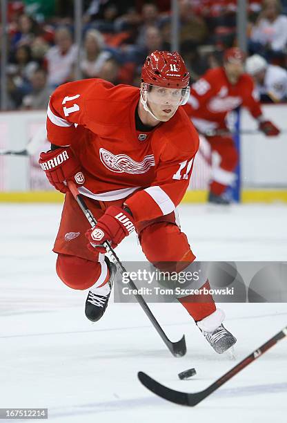 Daniel Cleary of the Detroit Red Wings skates with the puck during an NHL game against the Nashville Predators at Joe Louis Arena on April 25, 2013...